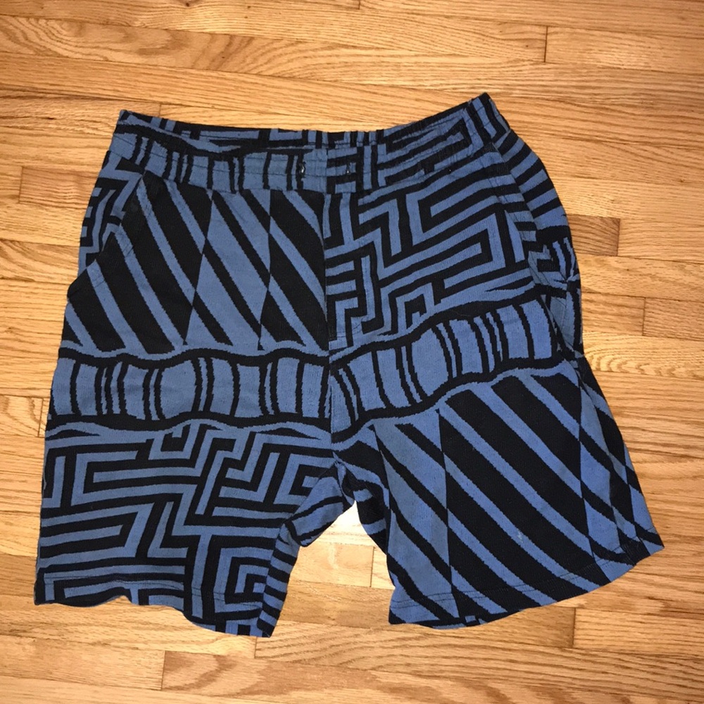 Blue shorts with black design
